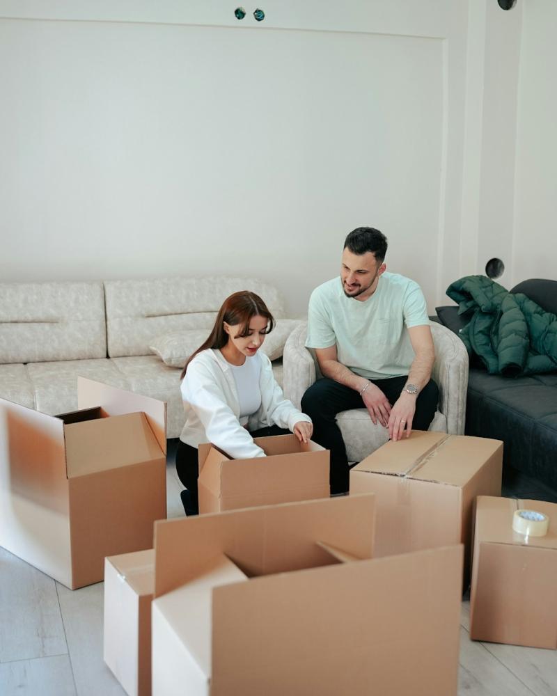 people unpacking boxes